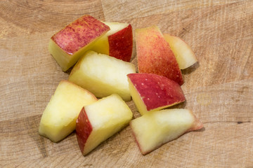 Apple chunks on a cutting board