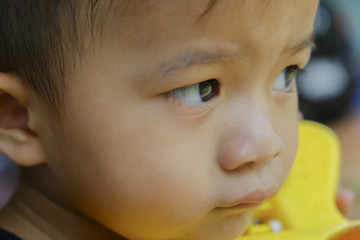 little asia boy in black shirt