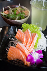 Set Of Sliced Salmon Sashimi And Green Tea