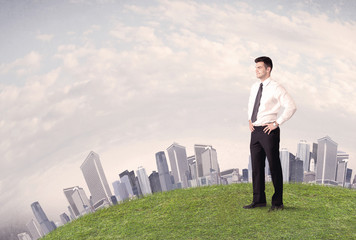 man standing in front of city landscape