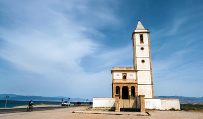 Obraz premium San Miguel Beach and Salinas church, take in Cabo de gata, Almeria, Andalusia, Spain