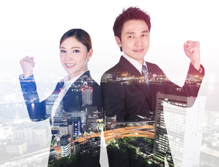 double exposure of successful business man and woman with arm raised with city background