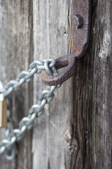 chain lock on wooden wall