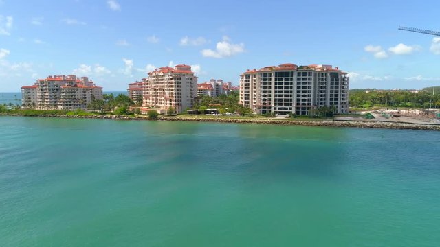Aerial drone approach Fisher Island Miami Beach 4k 60p