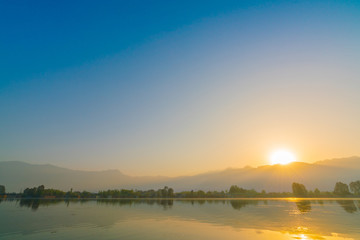 Sunrise on Dal lake, Kashmir India .