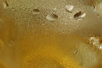 Close-up cold steam on beer glass