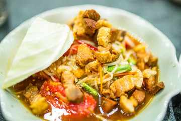 Papaya salad or Thai call somtum