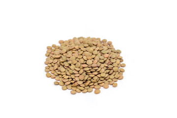 Heap of organic green lentils isolated on white background