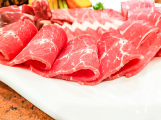 Uncooked raw fresh beef .