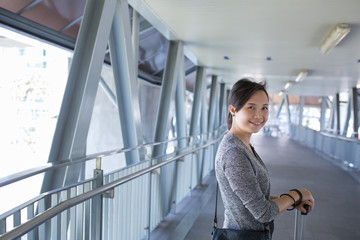 Asian woman traveller walking