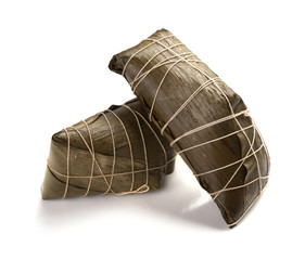 studio shoot of two wrapped Chinese ZongZi on white for Dragon Boat Festival ie DuanWu festival
