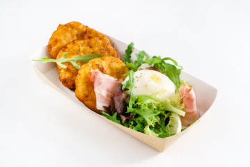 potato pancakes with egg and bacon