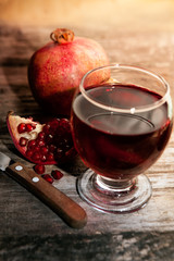 Glass of delicious and fresh pomegranate juice