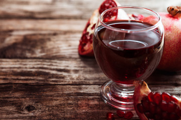 Close shot of glass with pomegranate juice
