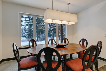 Dining room with round wood dining table
