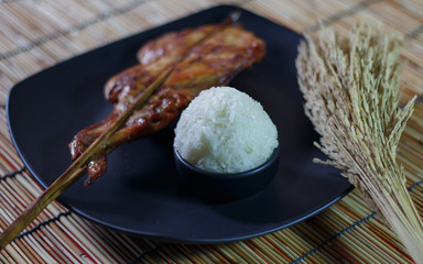 Grilled chicken or Roast chicken and Sticky rice, Lunch Thai food.