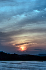Dusk and sunset  at Giritale Tank famous reservoir in Sri Lanka built by King Agbo 11 where wild animals like Elephants, Deer come to drink water, overlooking the Giritale Hotel