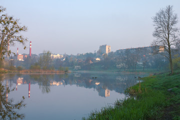 Obraz premium factory at river dam