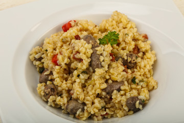 Bulgur with chicken hearts