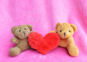 romantic two teddy bear and red heart on pink color backgrounds