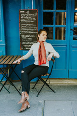 Woman in Paris cafe