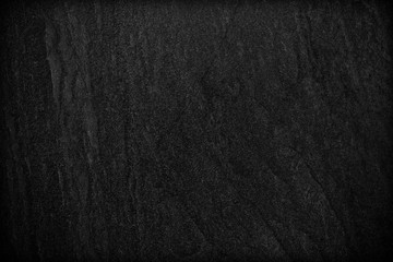 Dark grey black slate background or texture.