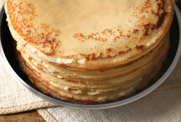 Tasty pancakes on pan, closeup