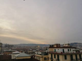 NAPLES, ITALY - JANUARY 28, 2017 : Rooftops view of Naples city on sunset