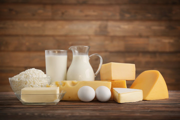 Different dairy products on wooden table
