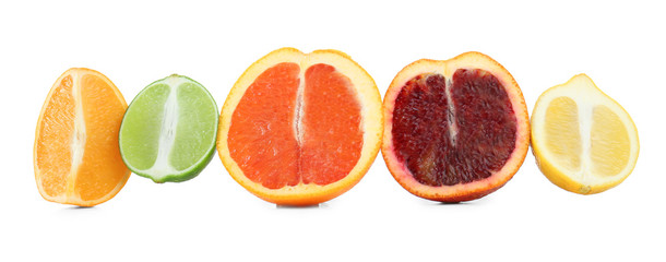 Juicy citrus fruits on white background