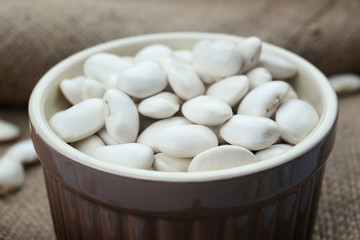 Ceramic bowl with butter beans, closeup