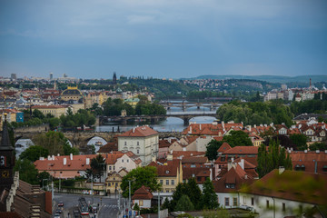 Fototapeta na wymiar Panorama of Prague with Red Roofs from Above Summer Day at Dusk, View from the height