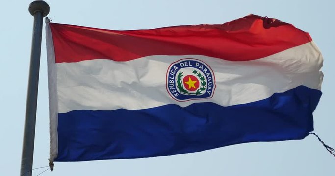 4k Paraguay flag is fluttering in wind.