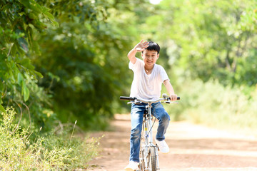 Young boy ride bicycle