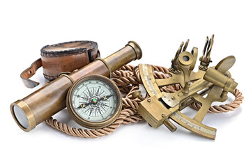 compass,sextant and spyglass on the white - 156988706