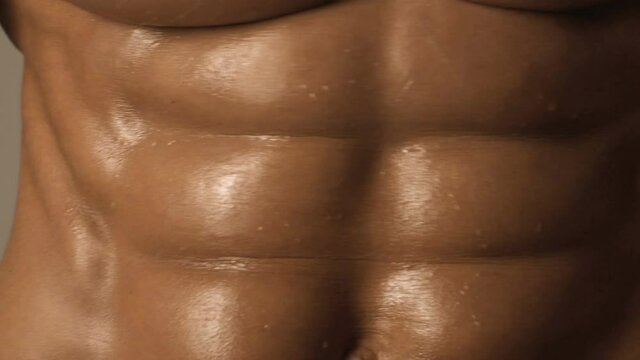 Naked torso. Power athletic man pumping muscles. Bodybuilder fitness model. Man strong muscular body. Model underwear sexy. Sexy body very muscular. Naked chest and abdomen with muscles in gym