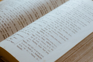 Old Dictionary of Hindi-English Language Open In Soft Focus.