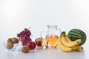 Group of fruits and juice, isolated on white