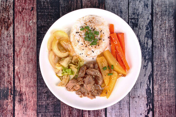 Thai jasmine rice in American korean style, Rice with sliced pork steak.