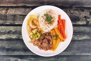 Thai jasmine rice in American korean style, Rice with sliced pork steak.