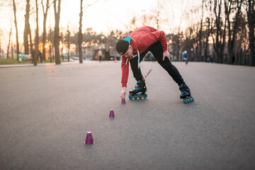 Roller skater in skates, balance exercise