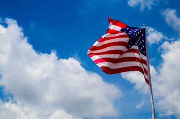United States flag.have blue sky background.