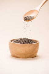 Close-up of raw, unprocessed, dried black chia seeds