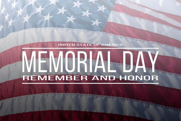 Text Memorial Day and Honor on flowing American flag background. Concept of Memorial day or...