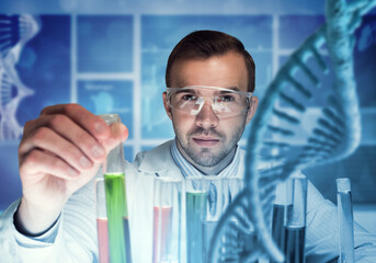 Young scientist mixing reagents in glass flask in clinical laboratory