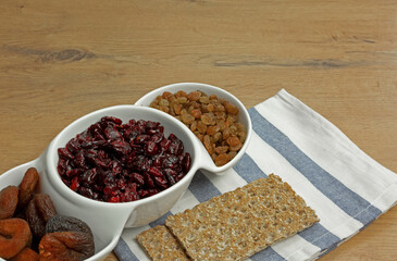 Three types of dried fruit and crisp bread