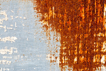 Fototapeta premium A background of peeling paint and rusty old metal