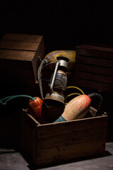 Vintage rusted lantern and nautical buoys