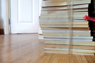 book stack tie with rope ,prepare to move.