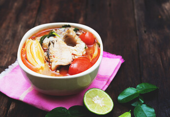 Tom yum soup with fish and spices hot spicy food